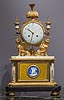 An extremely fine late Louis XVI gilt bronze mounted, painted marble, enamel, biscuit porcelain and verre églomisé mantle clock of eight day duration, signed on the white enamel dial Revel à Paris
